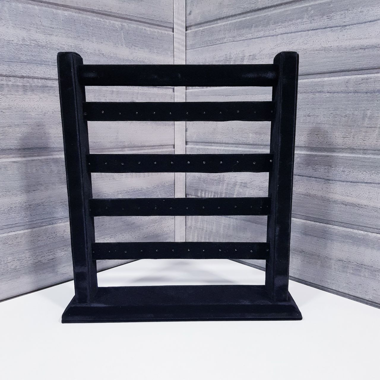 EXHIBIDOR PARA ARETES