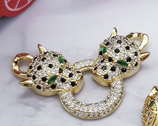 DIJE ARGOLLA CON DOS JAGUARES MICROCIRCONIA