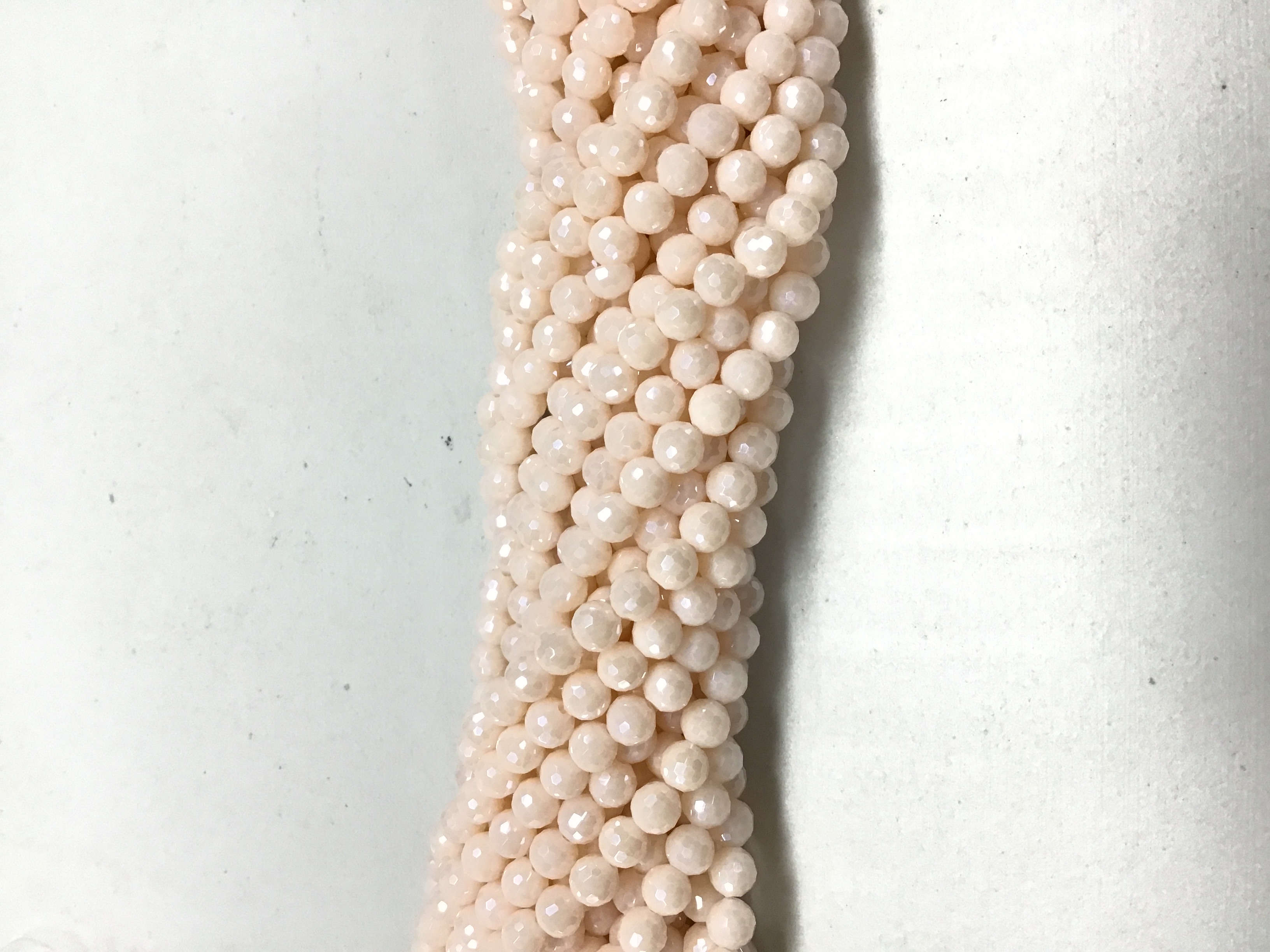 CRISTAL REDONDO FACETADO NUDE AB 6MM