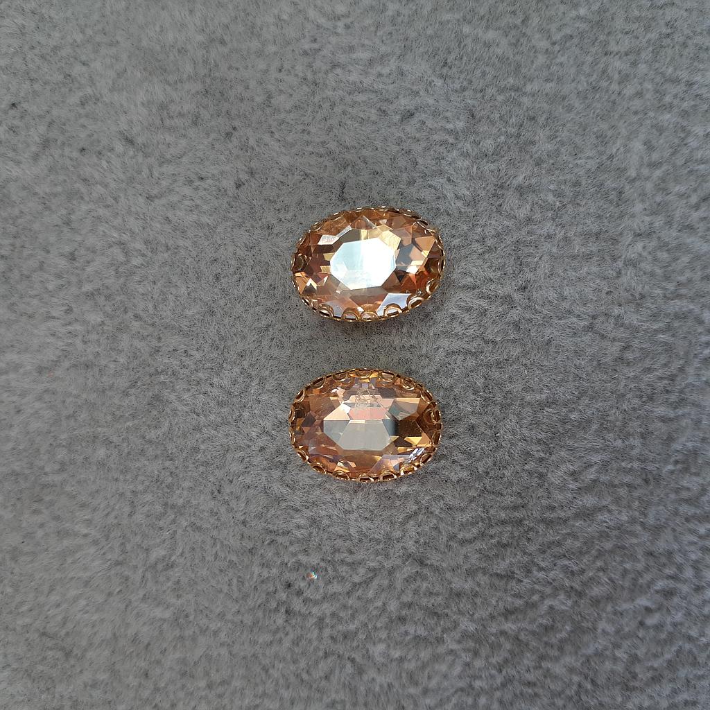 CRISTAL ENGARZADO OVALADO ORILLA DORADA  10X14MM