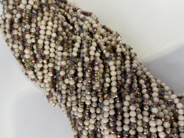 CRISTAL RONDEL BEIGE CON MORADO 4MM