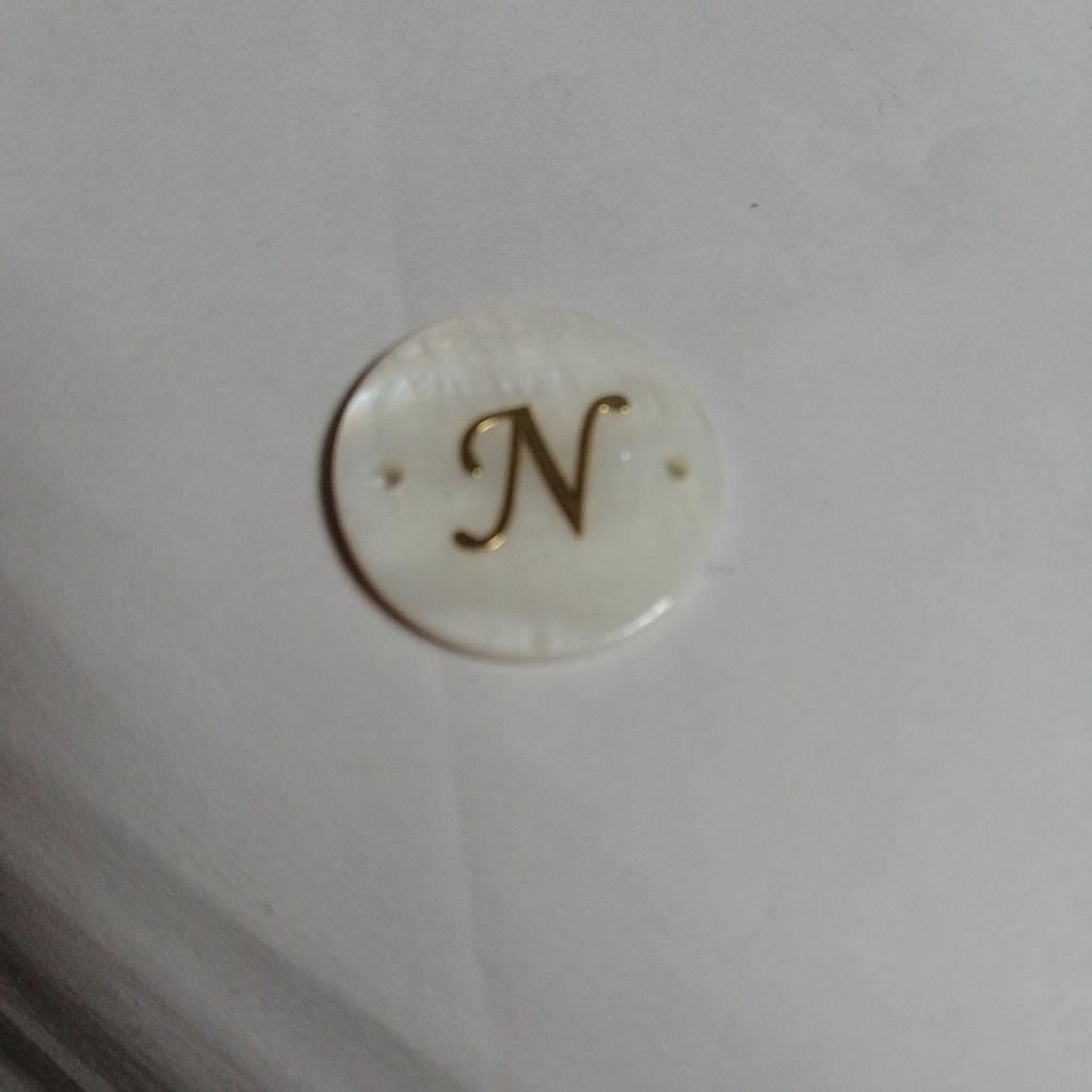 LETRA CONCHA NACAR N