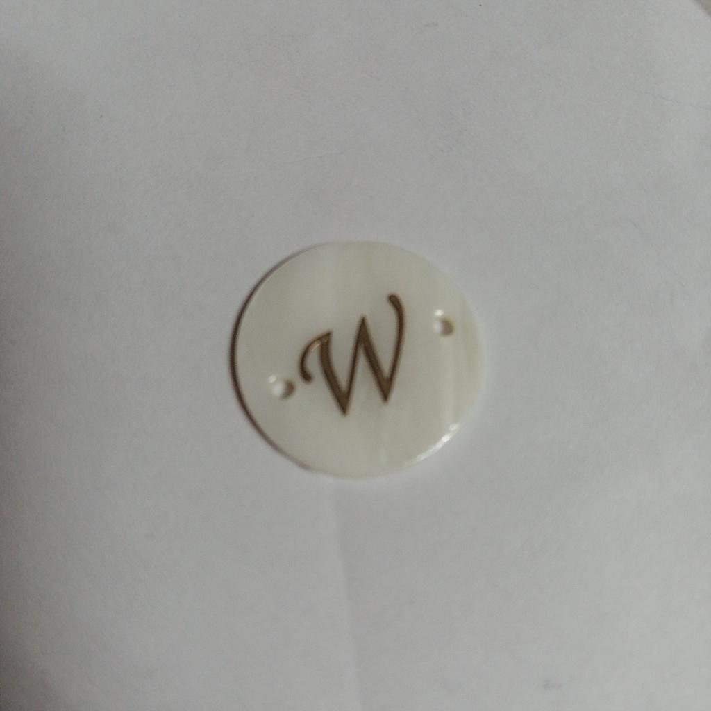 LETRA CONCHA NACAR W