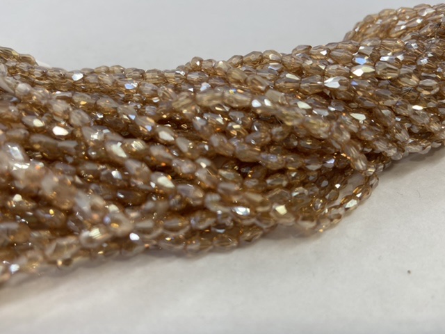 CRISTAL GOTA 4X6MM CHAMPAGNE
