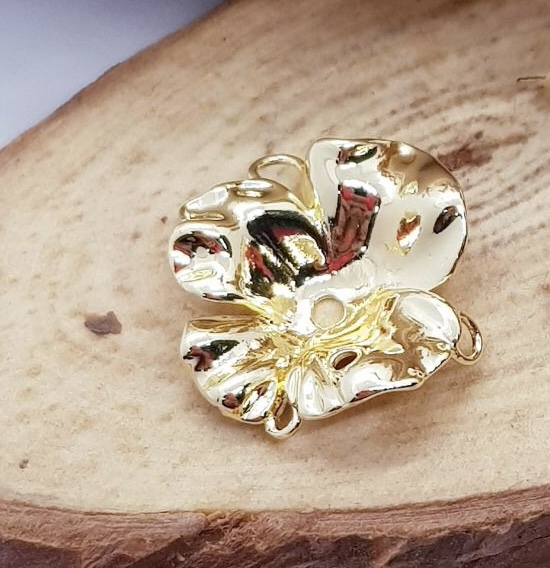 DIJE FLOR CON 3 ARGOLLAS ELECTROENCHAPADO