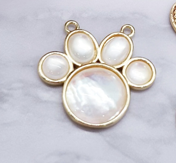 DIJE HUELLA CONCHA Y ELECTROENCHAPADO