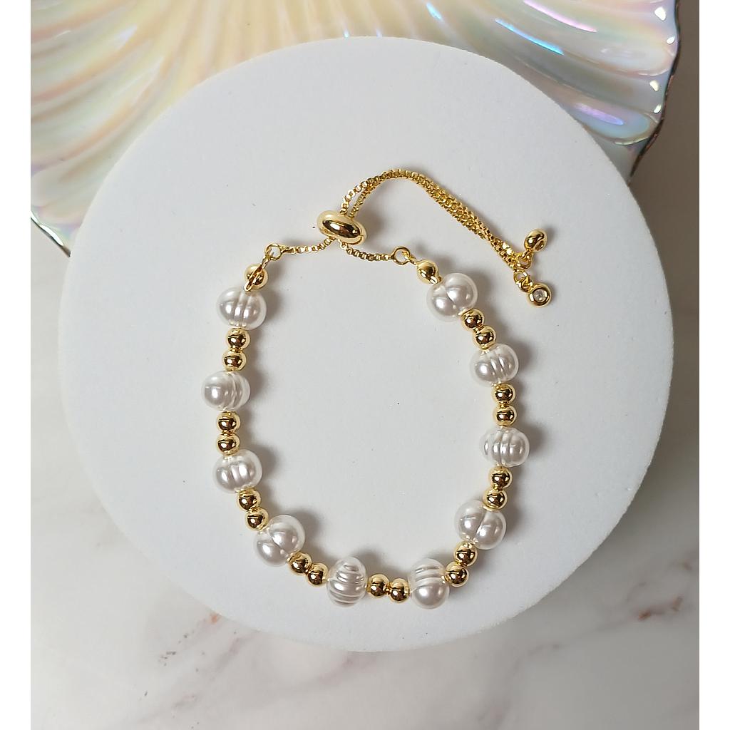PULSERA AJUSTABLE TERMINADA CON PERLA IMITACION DE RIO MICROCIRCONIA