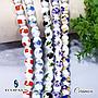 CERAMICA OVALADA CON FLORES 10X8MM